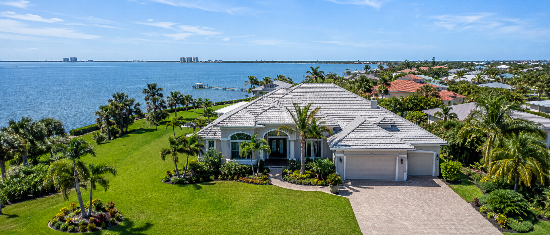 Luxury Florida home featuring a fiberglass entry door